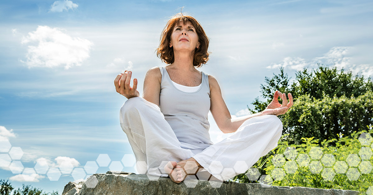 Woman Meditating Outside